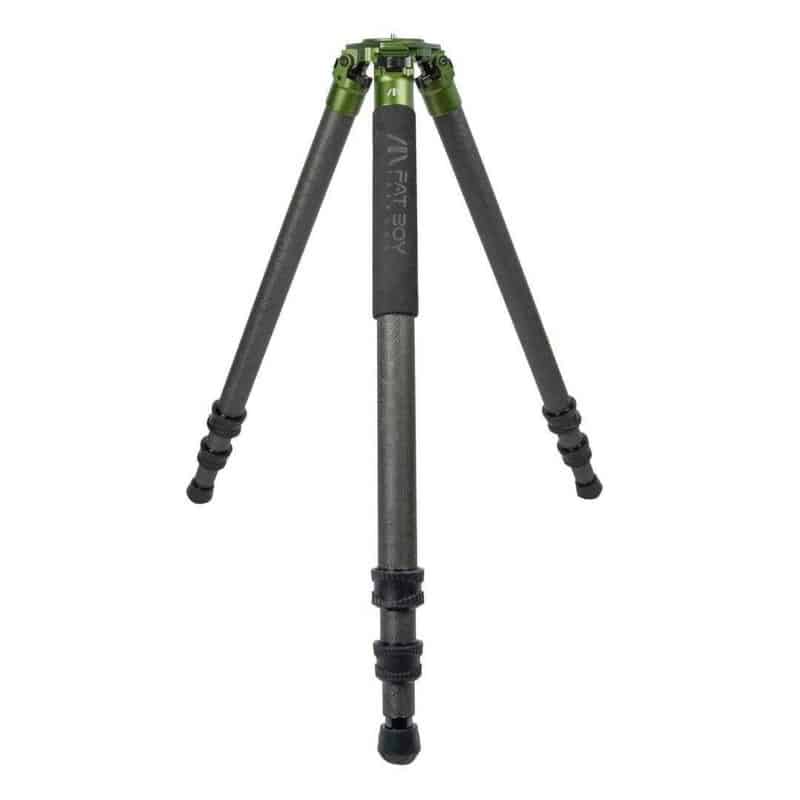 A tripod with a green and black handle.