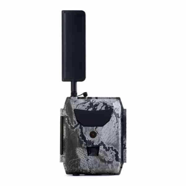 A black and white trail camera with a wireless transmitter.