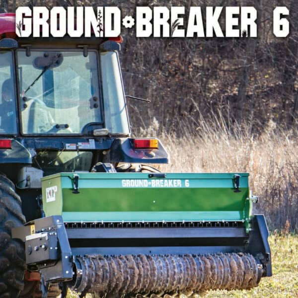 A tractor with the words ground breaker 6.